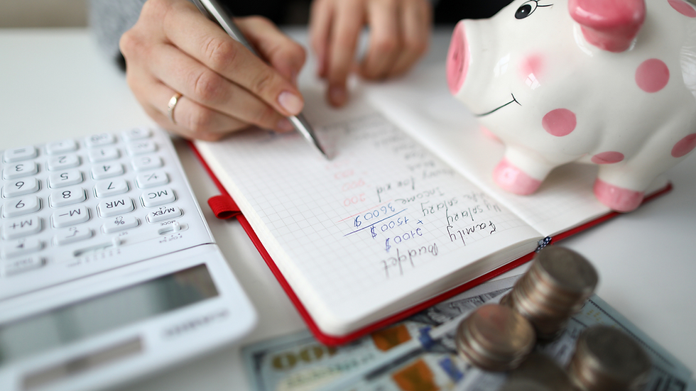 lady writing a budget plan