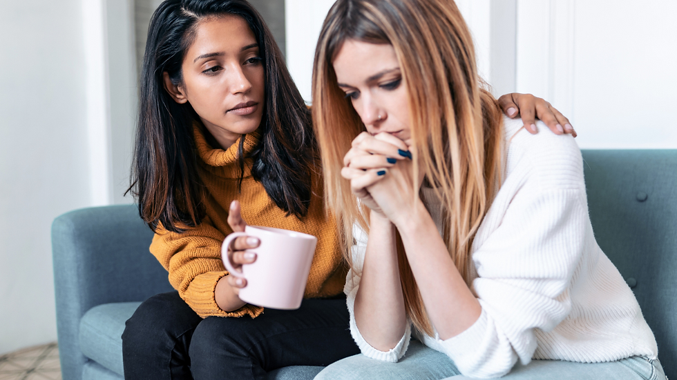 two women consoling each other