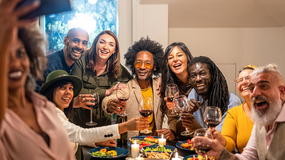diverse people having dinner together